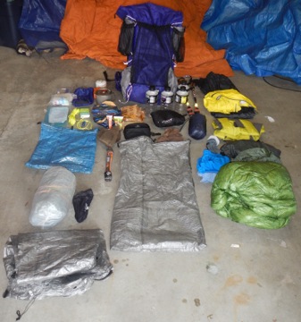Overall basic load with 30 degree sleeping bag and both a poncho and a 12 oz Merrell Rain Suit – weight without food or water and 2 qts powerade bottles is 11.5 pounds. 